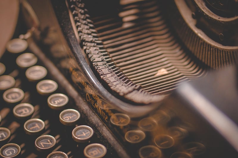Typewriter and Notebook